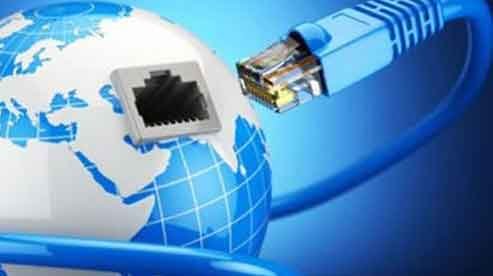 A professional telecom technician installs voice and data cables in a modern server room, showcasing precision and reliability in business communication infrastructure.
